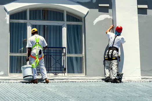 Painting crew on a commercial facade in Agoura Hills