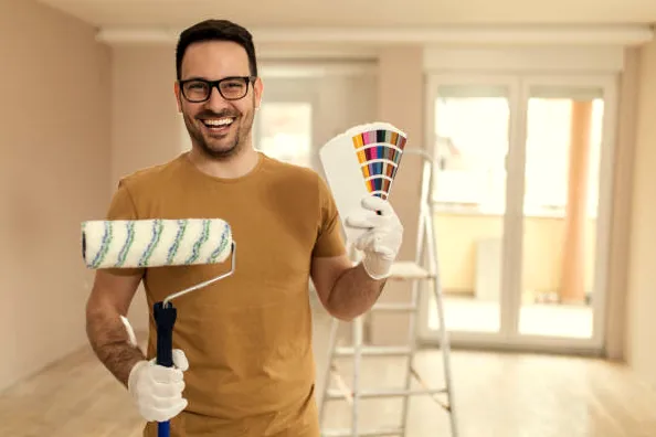 Westlake Village painter with roller and color samples